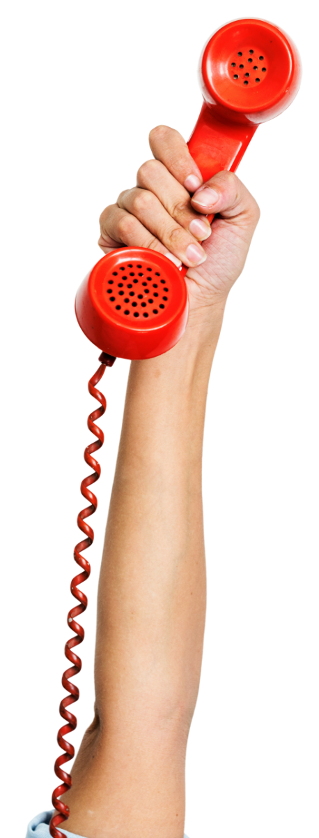 Hand holding a red rotary telephone receiver with a coiled cord.