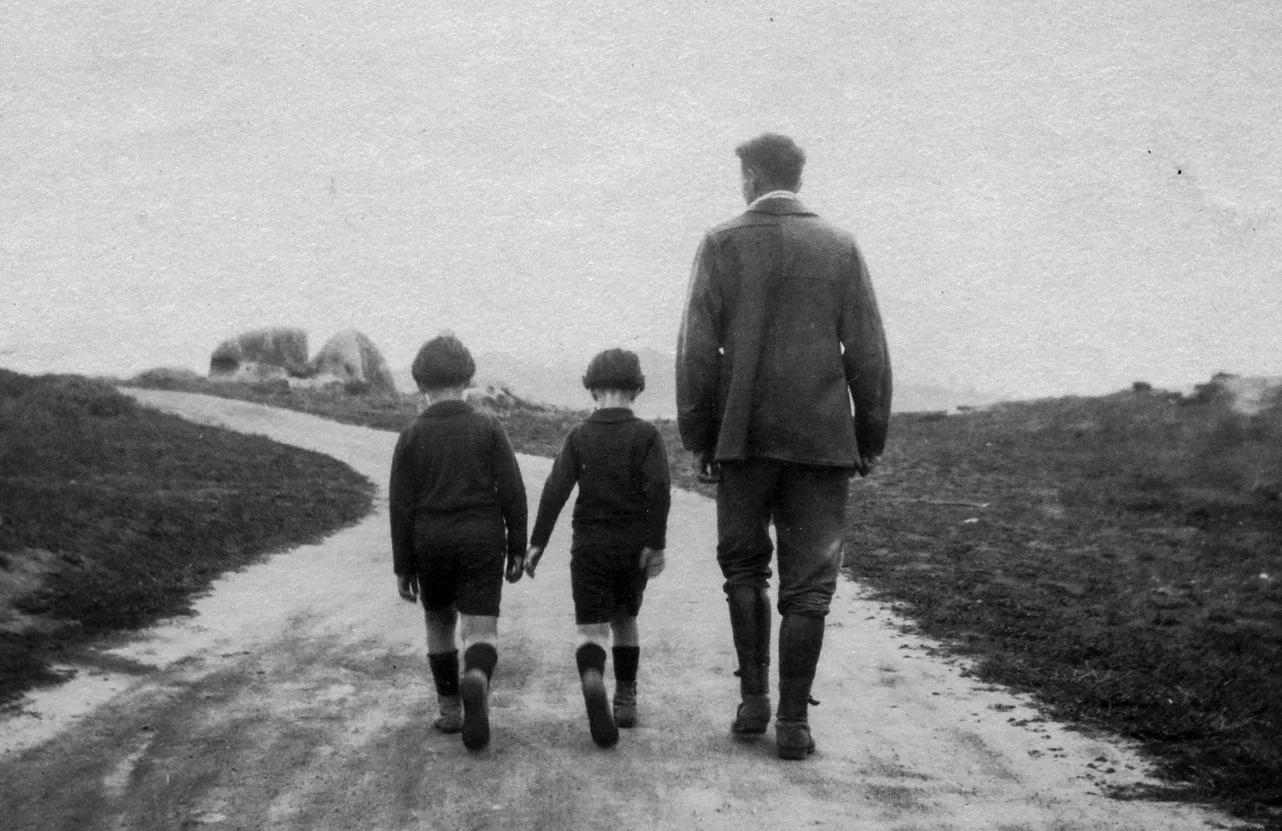 Robinson Jeffers walking a path with 2 boys