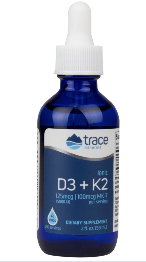 Blue dropper bottle labeled Trace Minerals D3 + K2 dietary supplement.