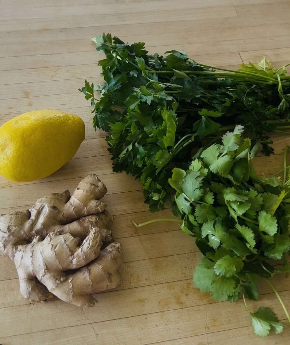 lemon, green herbs, and ginger