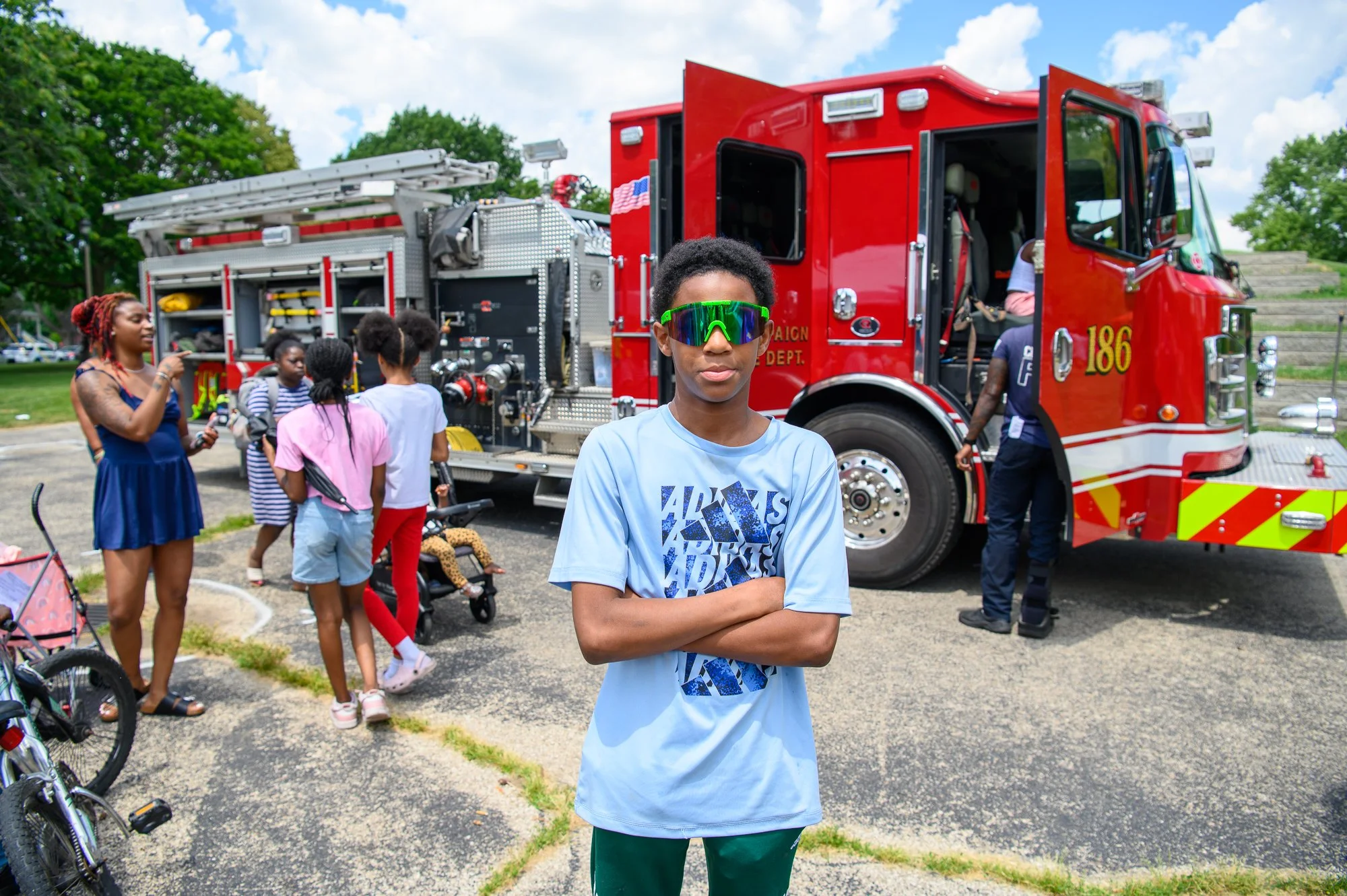 Children gathered at Douglass Park for the Housing Authority of Champaign County's end-of-schoolyear celebration, joined by community organizations and first responders. (Housing Authority of Champaign County)
