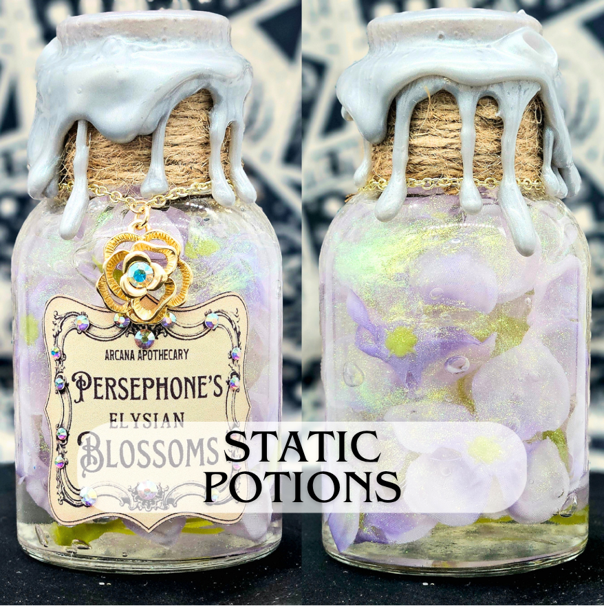Two glass jars labeled 'Persephone's Elysian Blossoms' with decorative charms and white melted wax or icing on the lids, surrounded by flowers and done in a fantasy or magical aesthetic.