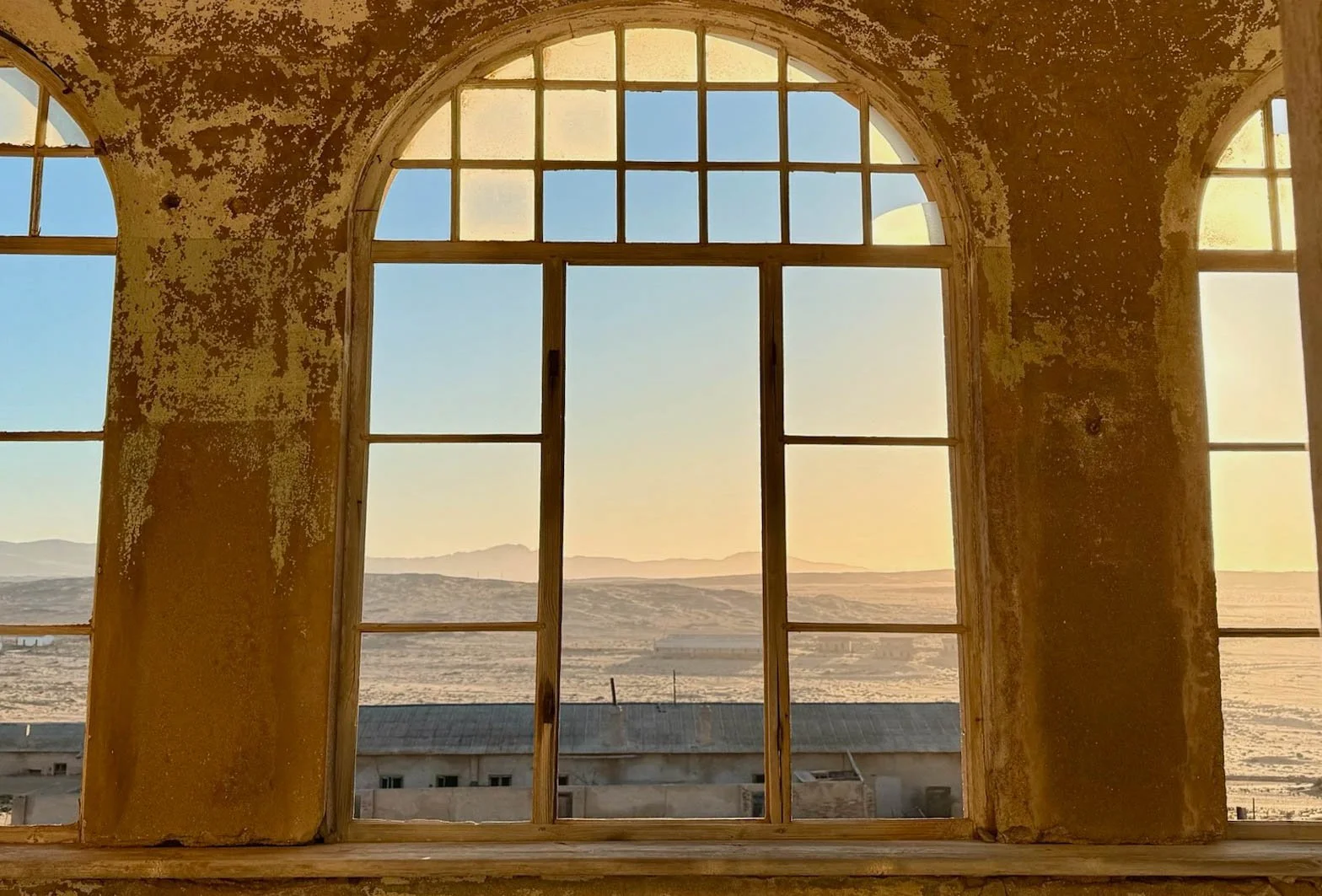 Windows framing a landscape