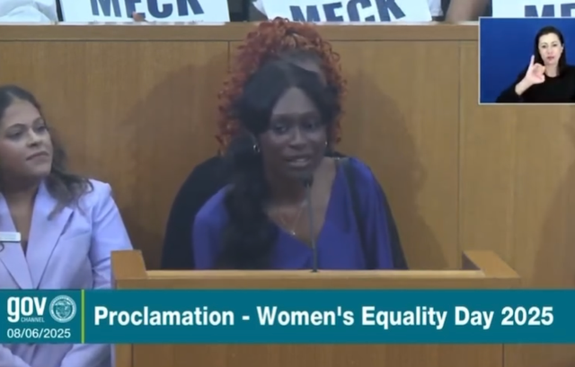 Mecklenburg County's Women's Advisory Board receives a Women's Equality Day Proclamation from the Board of County Commissioners