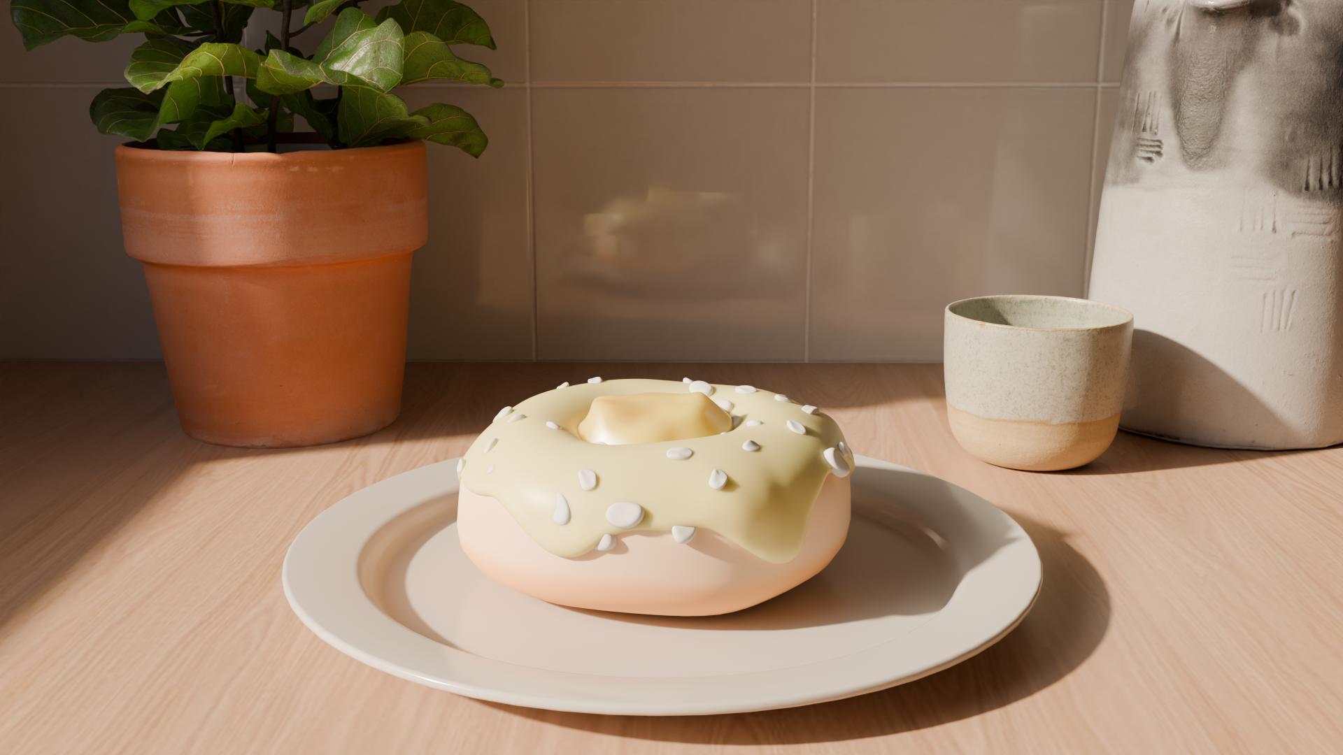 A white frosted donut with white icing and almond slices on top, placed on a white plate on a light wood table. In the background, a potted plant with green leaves, a small empty cup, and a textured white vase are visible.