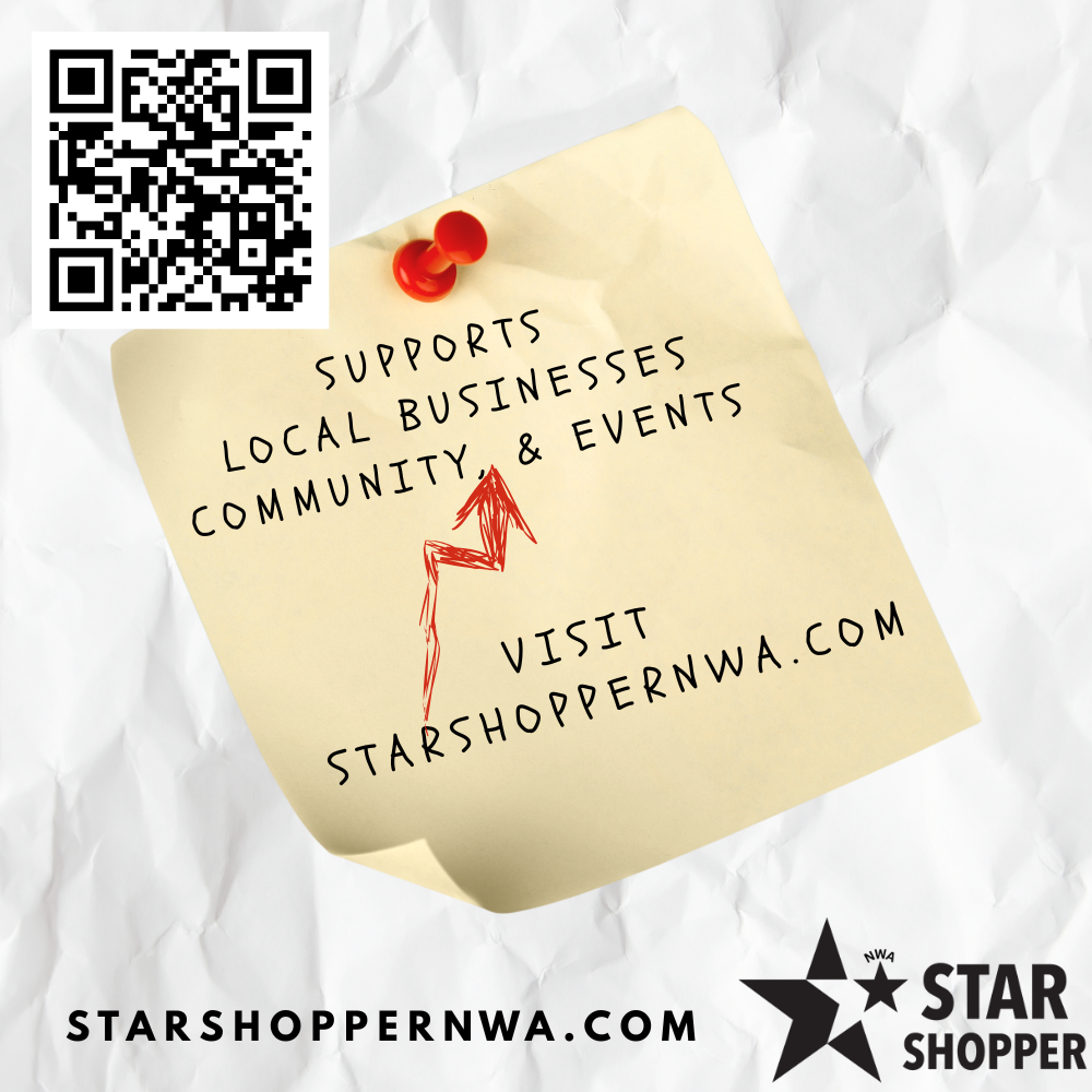 A crumpled yellow sticky note with black handwritten text supporting local businesses, community, and events, pinned with a red pushpin, on crumpled paper, featuring a website URL "starshoppernwa.com" and the STAR Shopper logo with a black star and the letters NWA.