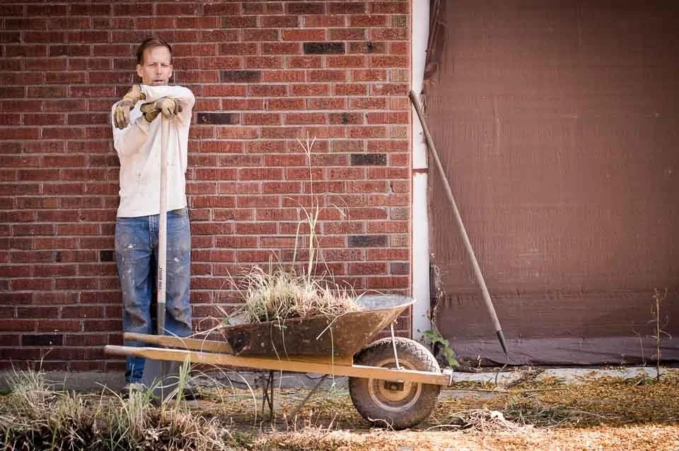 [5/100] Jeff - While out for a walk with my 11 month old son, I passed this Fall scene with the wheelbarrow, rake, and shovel sitting idle. Clearly someone had merely paused for lunch, so I circled around the block a few times until Jeff returned to 