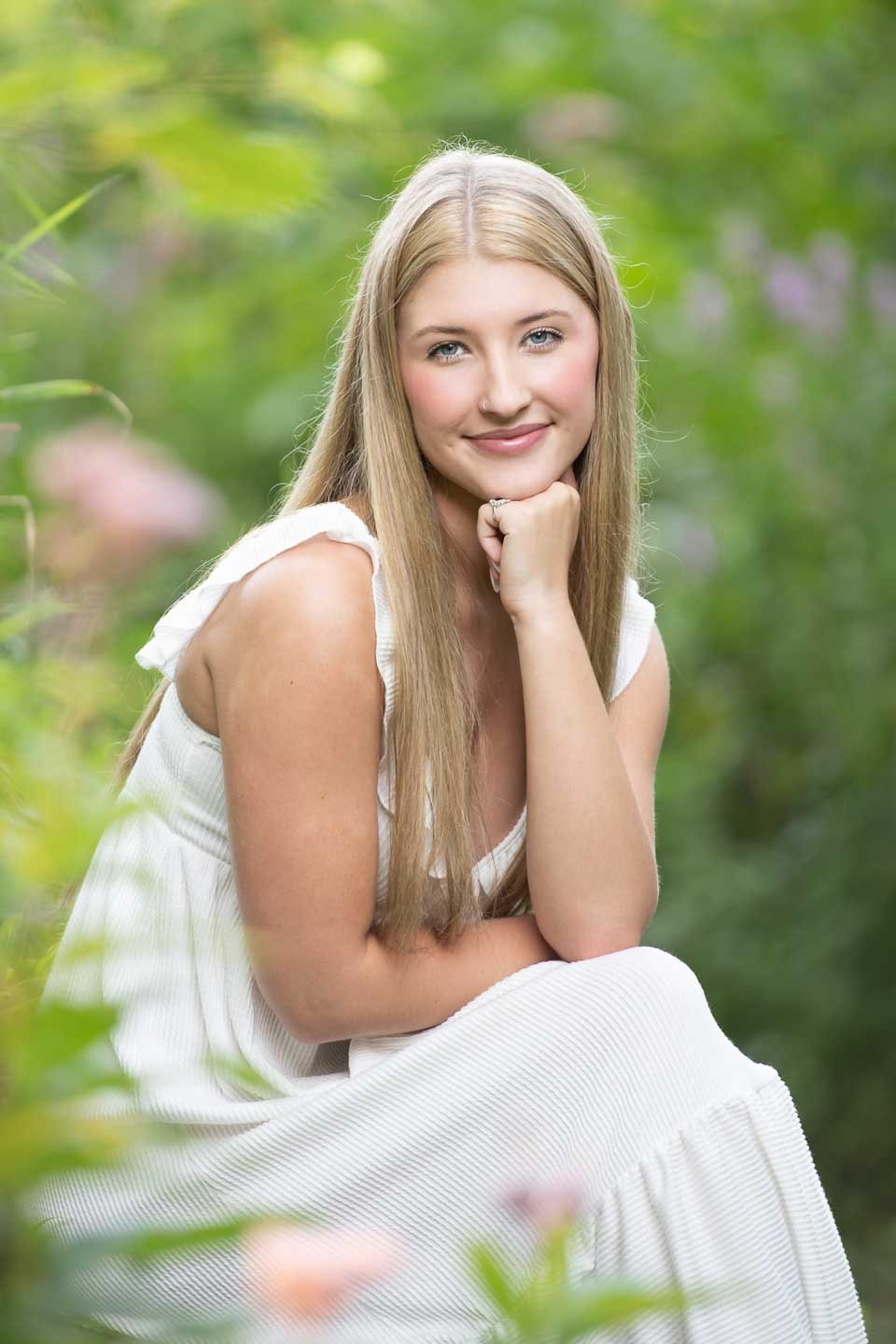 senior-girl-posing-ideas-seated-garden.jpg