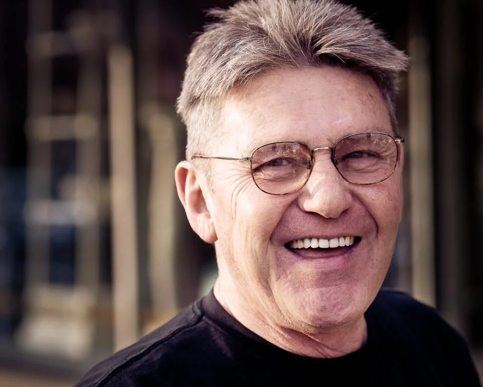 [13/100] Jeff - I was waiting at a crosswalk outside of Eastown Antiques when Jeff commented on my camera (probably more on the lens (Nikon 70-200 f/2.8). We chatted for several minutes about cameras and photography and then I described the 100 Stran