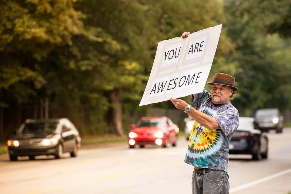 [30/100] Bob - I was driving recently and passed Bob with this sign. I drove a couple of more miles, then turned around and went back to introduce myself to Bob. He explained that he was part of a dispersed flashmob of people with this message. As I 