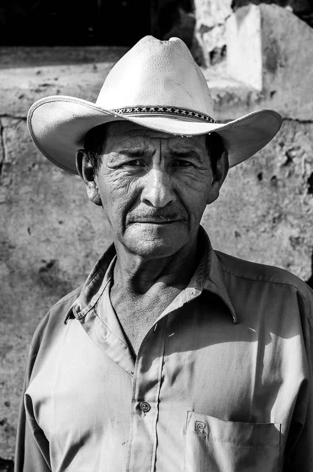 traditional-guatemalan-man-portrait-cowboy-hat.jpg