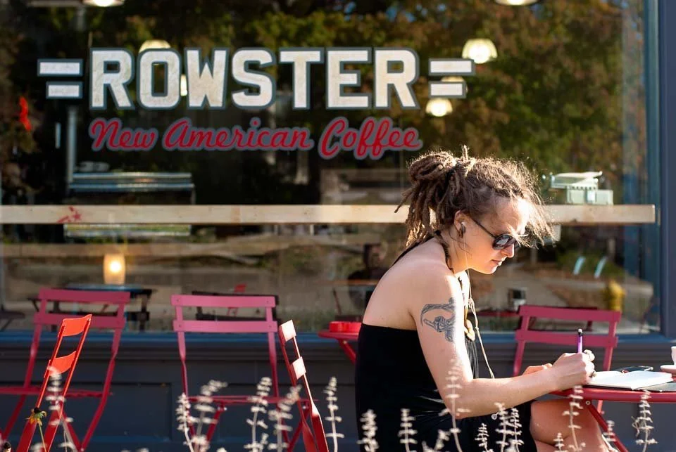 [8/100] Vanessa - I stopped in to Rowster's Coffee (best coffee in Grand Rapids) for a pound of fresh roasted El Salvadorian whole bean. I passed Vanessa on the way in, noticed the light and the scene, and it started the wheels turning. My camera was