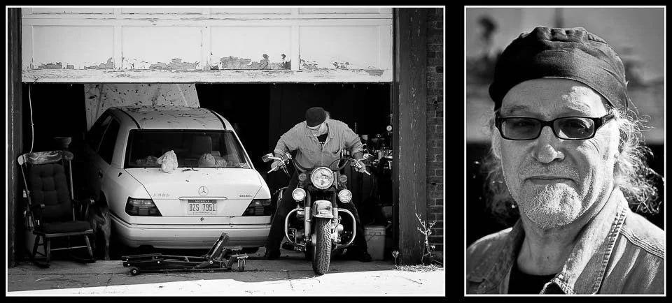 [6/100] Kevin - The half-raised door, rocking chair and car had already caught my eye as I was approaching and, when Kevin started to roll a bike out of the darkness, the photo formed itself. He, somewhat amused, agreed to a few shots.
