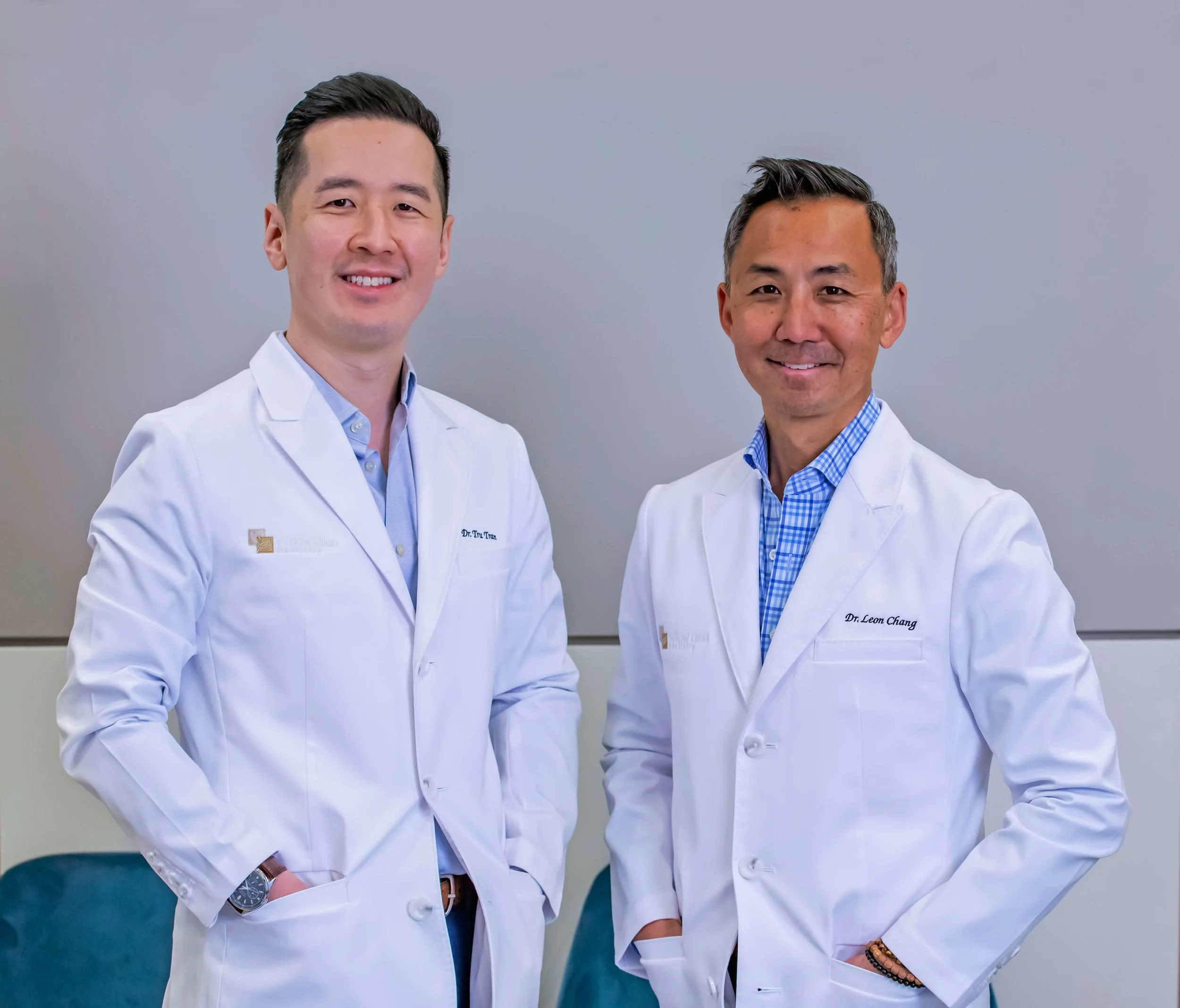 Dr. Tru Tran and Dr. Leon Chang posing in their Willow Glen Dentistry Office in San Jose together.