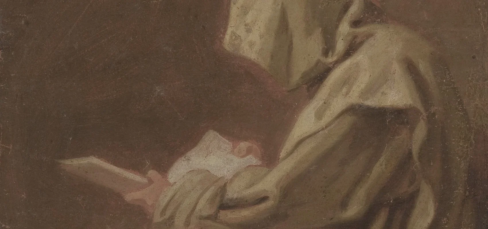 Close-up of a woman reading a book, her face partially visible, with her hand resting on her cheek, in a contemplative pose.