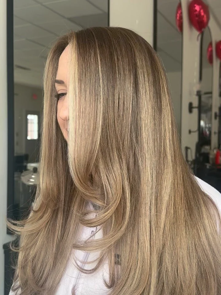Soft dimension. Seamless blend. Effortless grow-out.

Customized placement, soft brightness around the face, and a tone that keeps things neutral, not brassy.

Maintenance: 3&ndash;4 months
Gloss refresh in between for shine + tone

Long Island blond