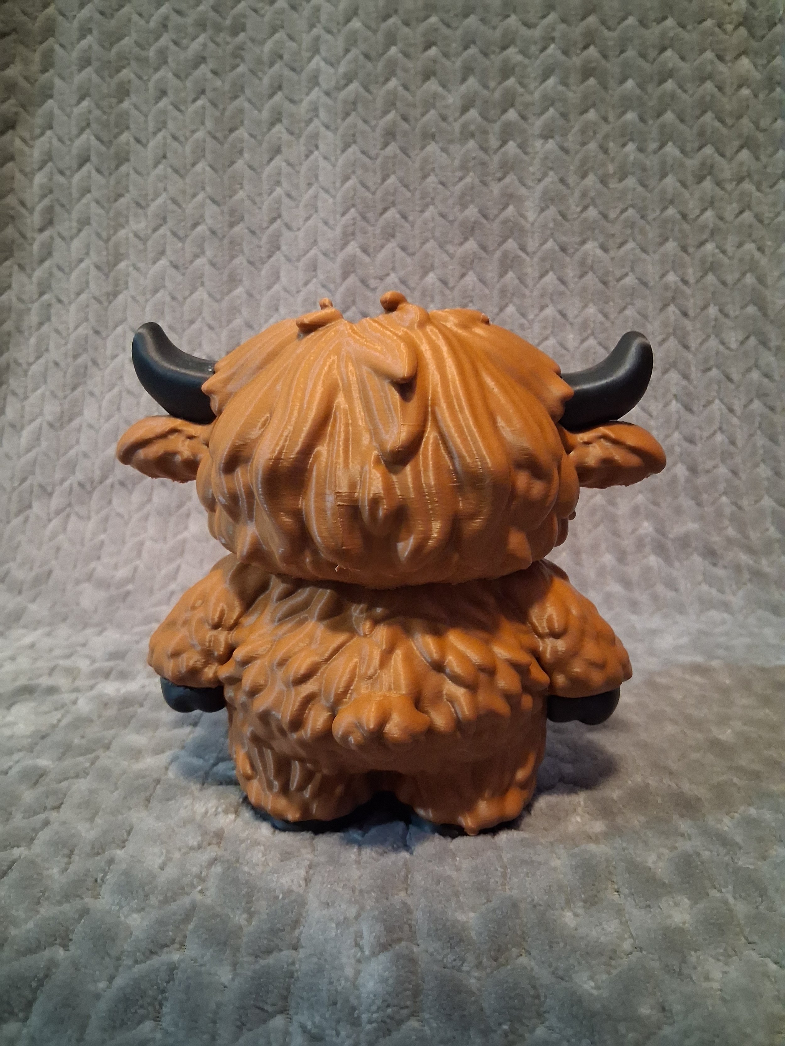 Brown-tan nose- black eyes,horns,hoffs (back).jpg