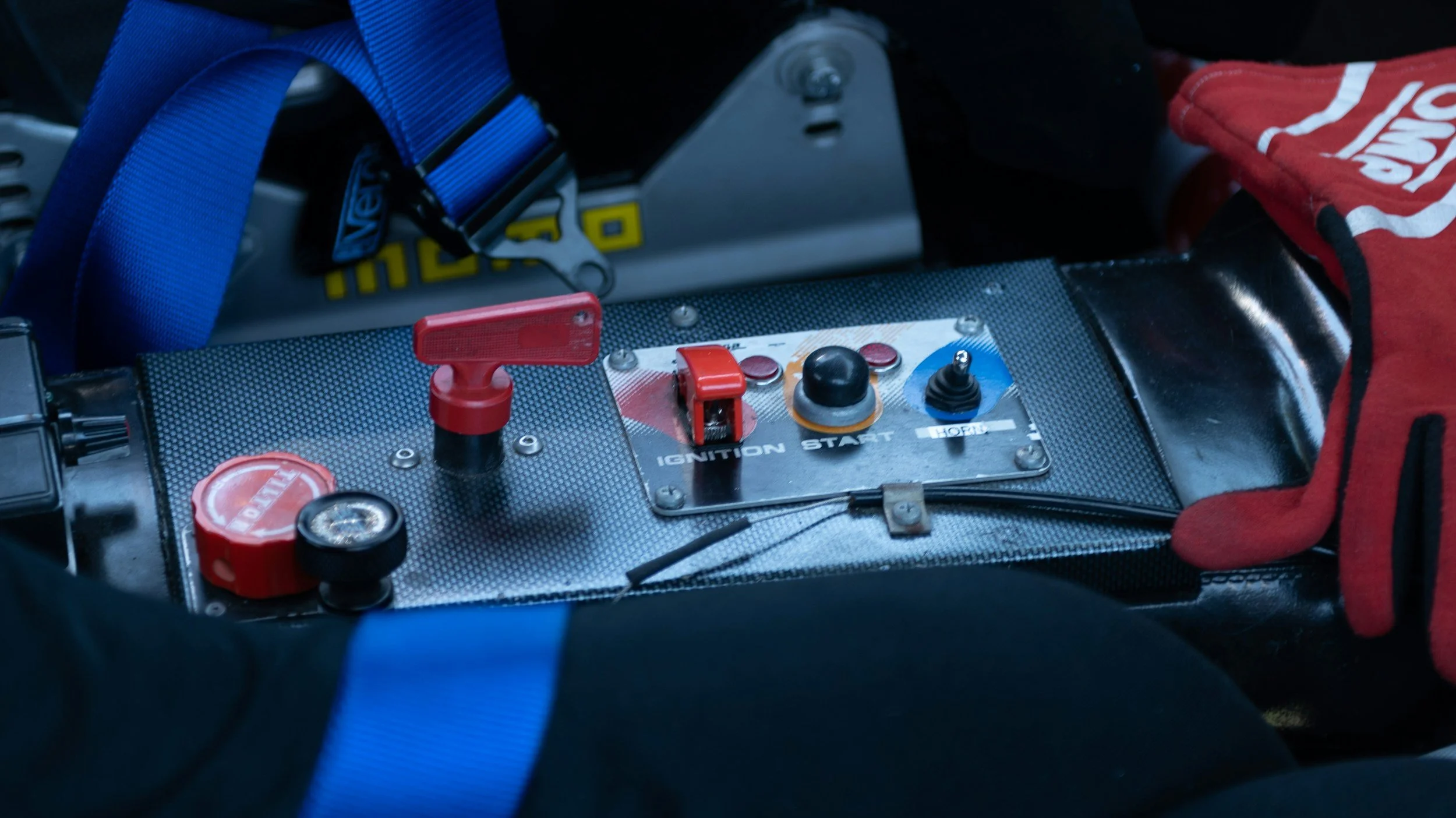 Car diagnostic scanner connected to vehicle system Auto electrical testing using diagnostic equipment Vehicle battery testing inside workshop Check engine light diagnostic scan in progress