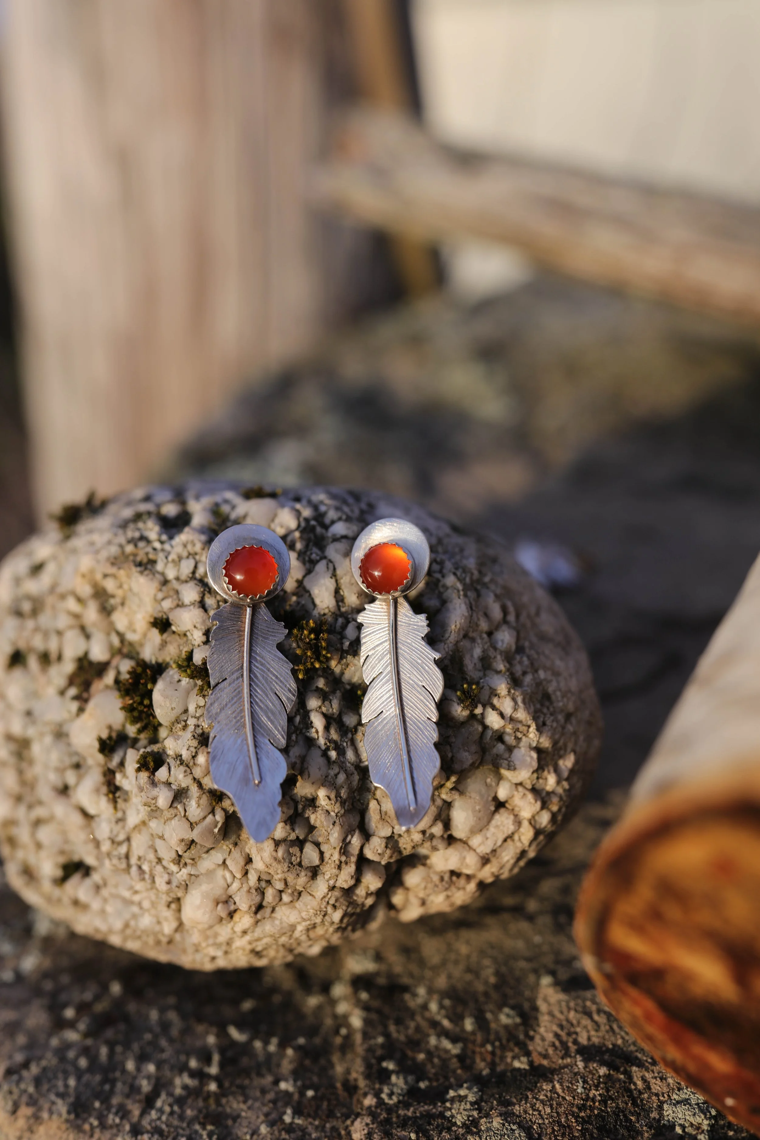 earings feather with carnelian posts.jpg