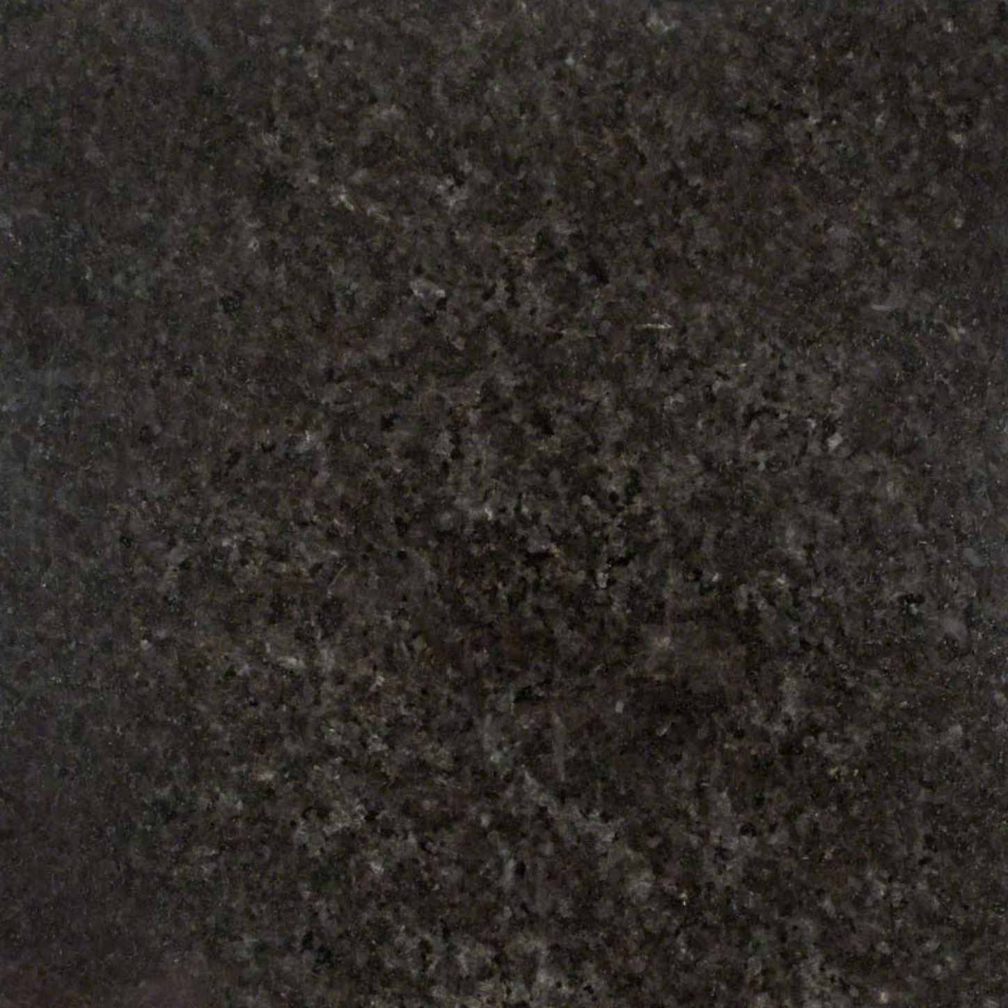 Black Pearl Granite. A Dark granite stone texture with a speckled pattern.