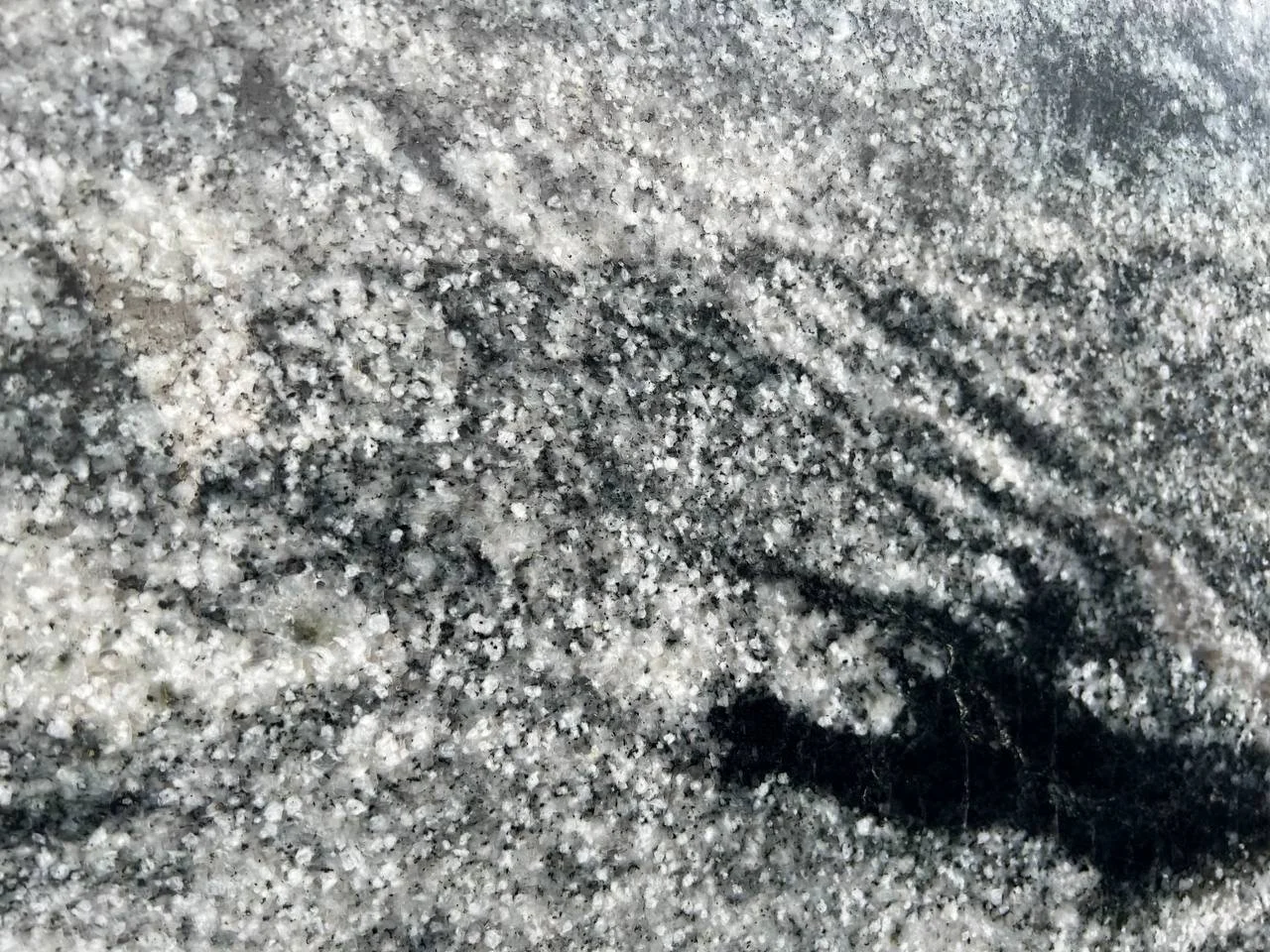 Silver Cloud Granite. A Close-up of black and white granite texture