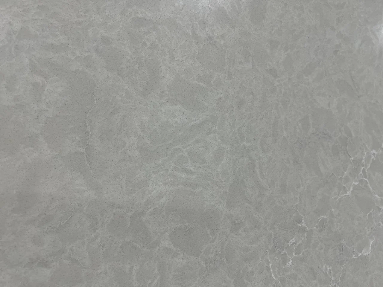 Argos Quartz. A Grey marble surface with subtle veining.