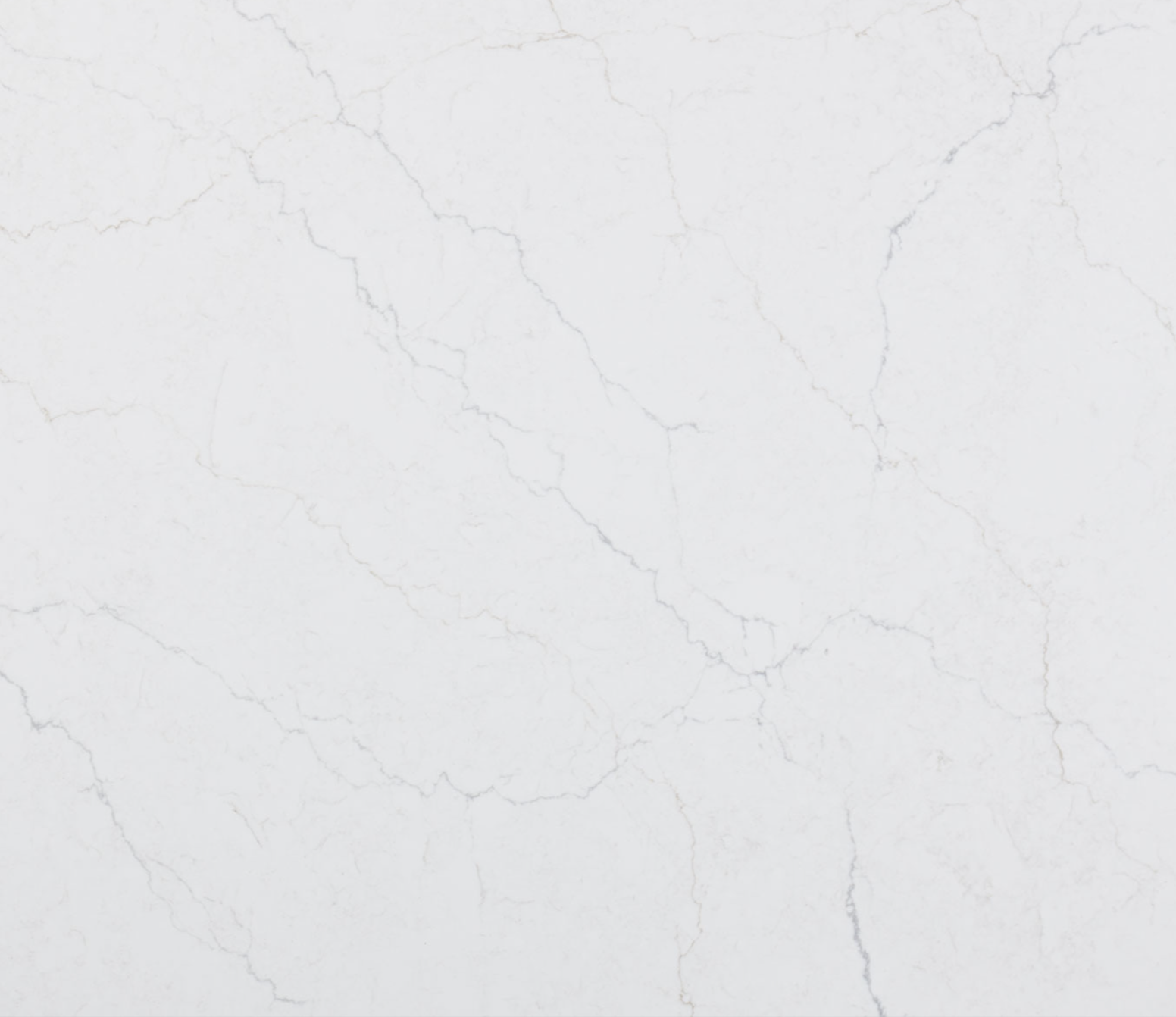 Calacatta Miraggio Duo Quartz. A White marble surface with subtle gray veining.