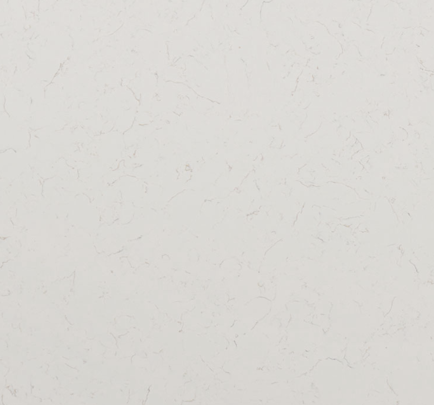 Carrara Miksa Quartz. A White marble texture with subtle gray veining.