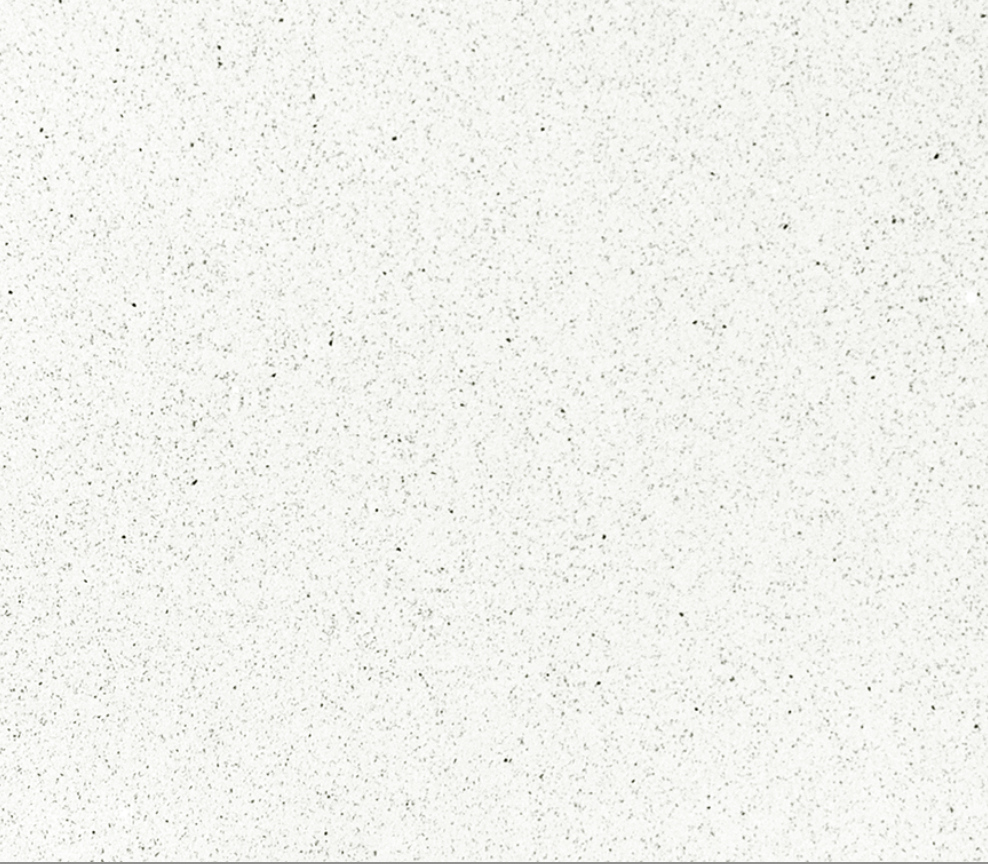 Sparkling WhiteQuartz. A Close-up of a white textured surface with small dark speckles.