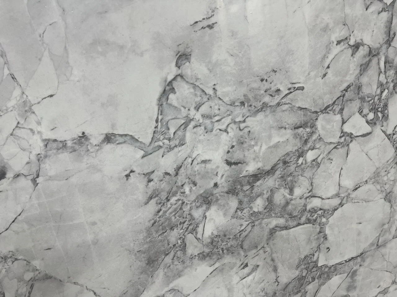 Super White DP Quartz. A White and gray marble texture background.