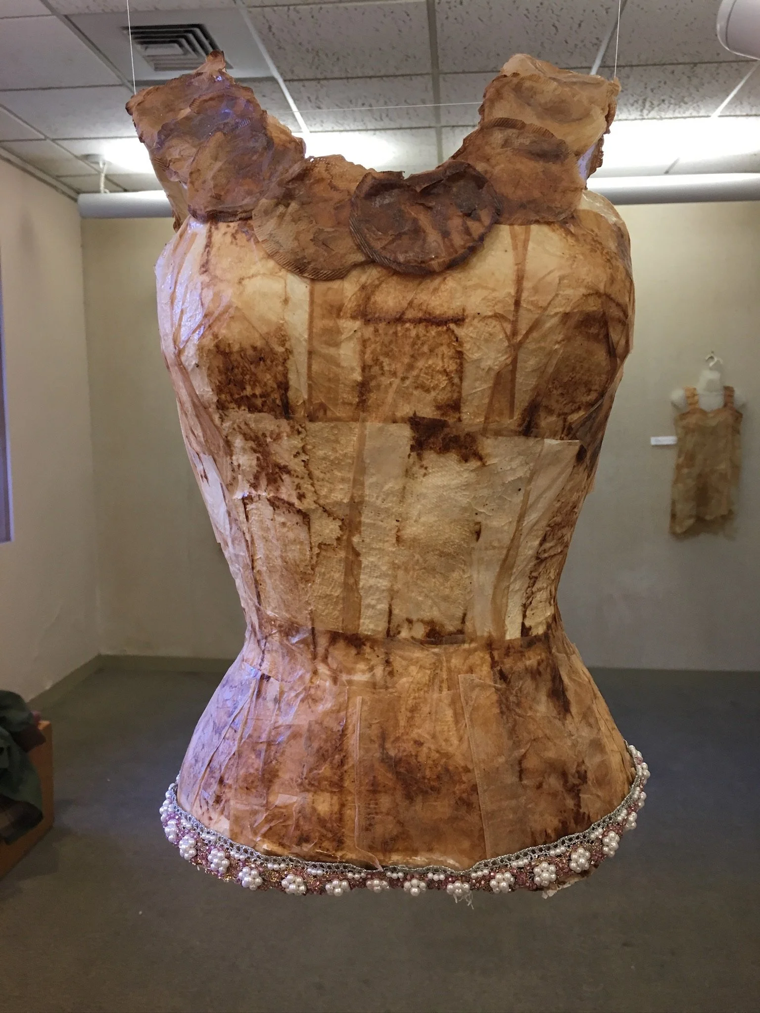  Untitled  
Tea bags and fabric on plater torso
