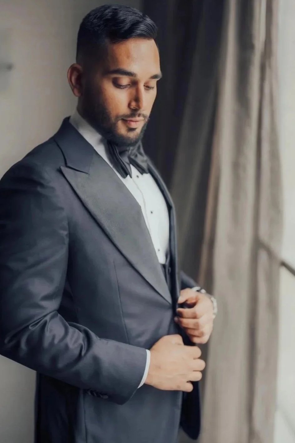 Joshua in his wedding tuxedo, styled by Sham.