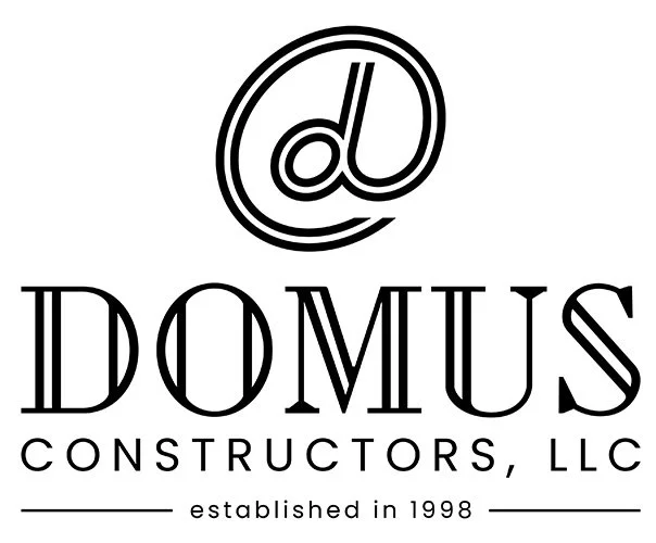 Logo for Domus Constructiors LLC featuring a stylized 'd' and 'u' inside a circle, with the company name and 'established in 1998' text.