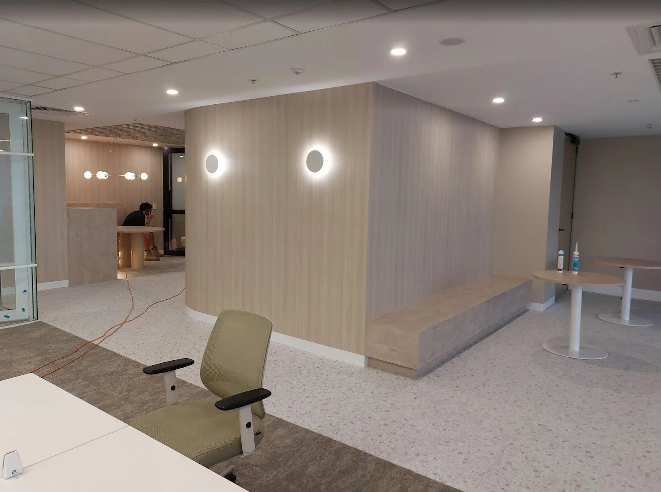 Refurbished office interior walls featuring high-end 3M Di-Noc architectural film installation in Brisbane.