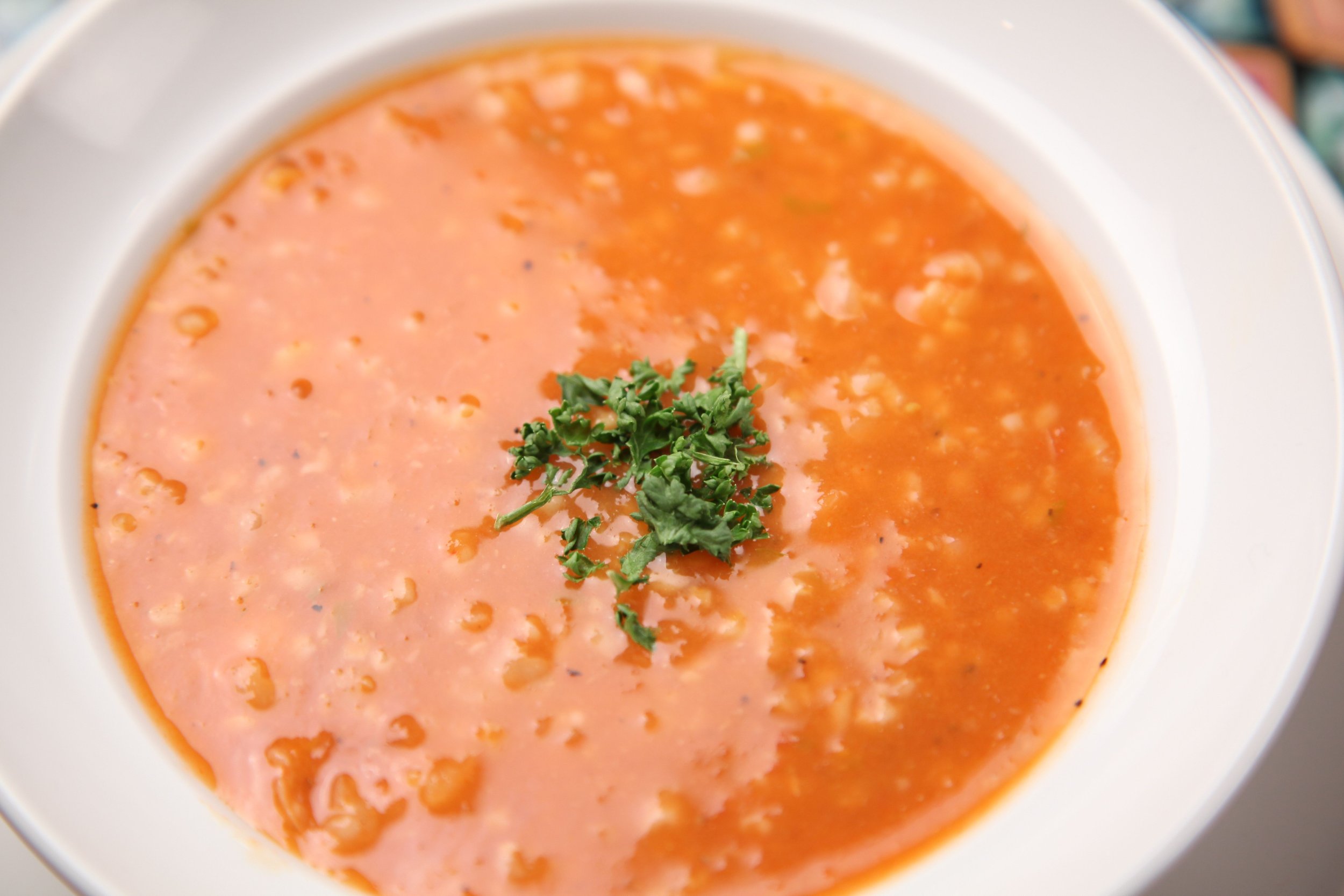 Bowl of creamy red lentil, carrot and squash stew for a vata balancing fall cleanse