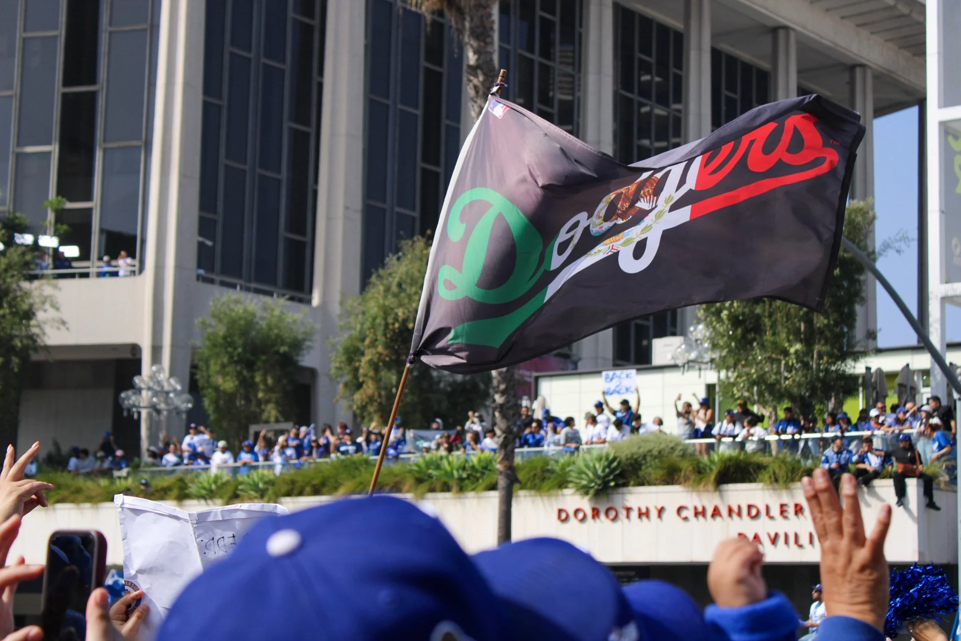Dodgers flag being waved during World Series parade / Destiny De La Cueva, October 2024