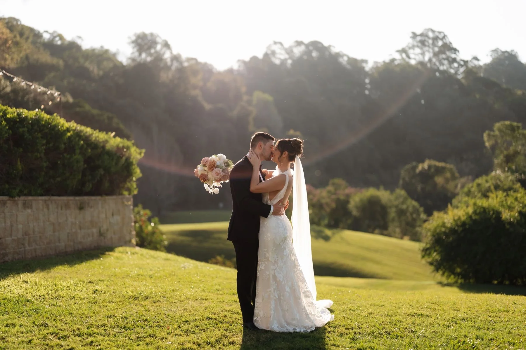 Golden Hour Wedding at Maleny Manor Sunshine Coast Hinterland with Bride & Groom Kissing