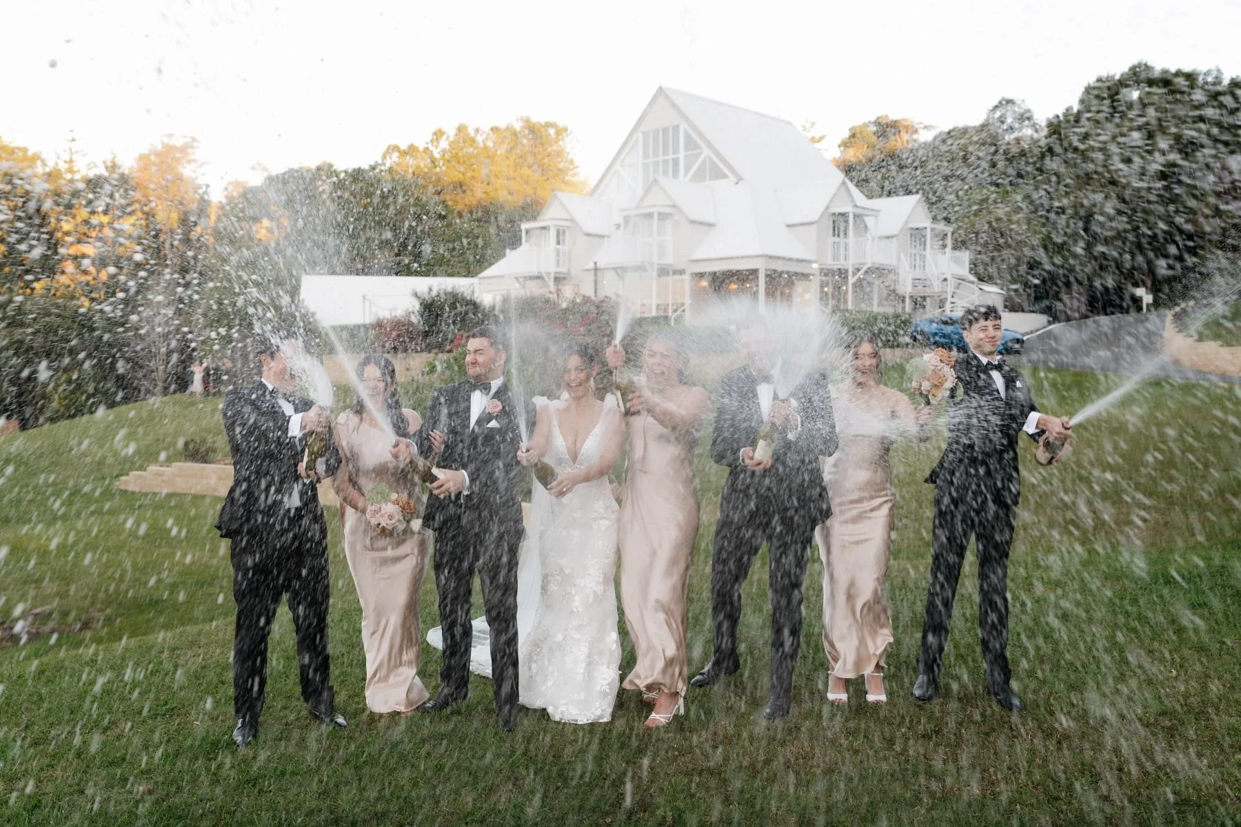 Champagne Spray Wedding Photos