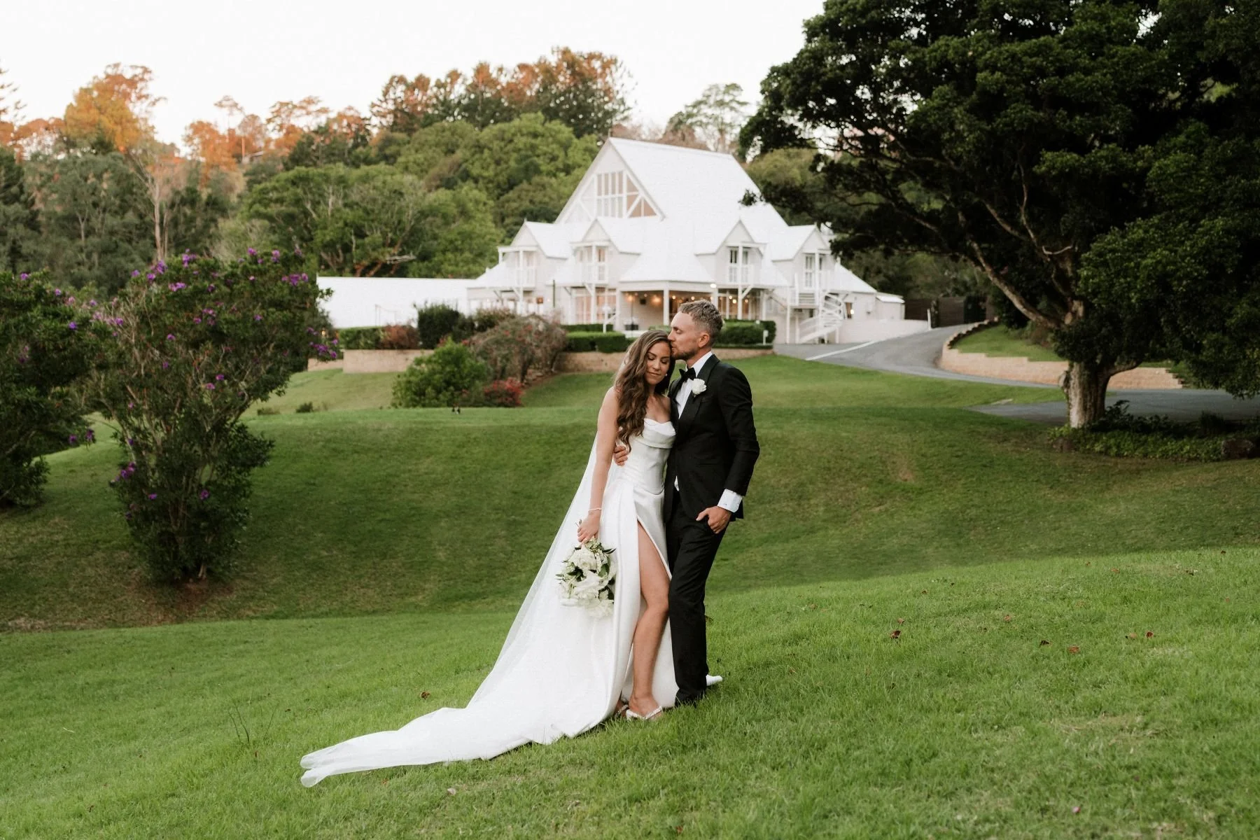 Maleny Manor Wedding Venue Sunshine Coast Bride & Groom on rolling hills at Maleny Manor