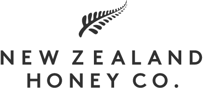 Logo for New Zealand Honey Co. featuring a stylized honeycomb and leaf design