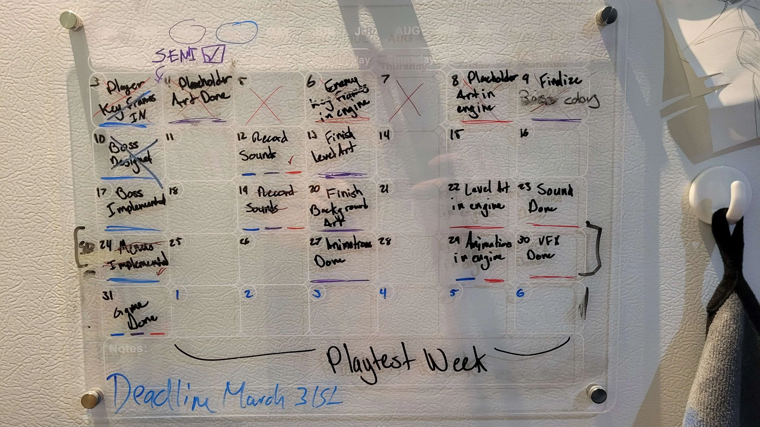 Our last month of production was on a tight schedule we had posted on our fridge. We only had one week to playtest and bug fix before the spring show! 