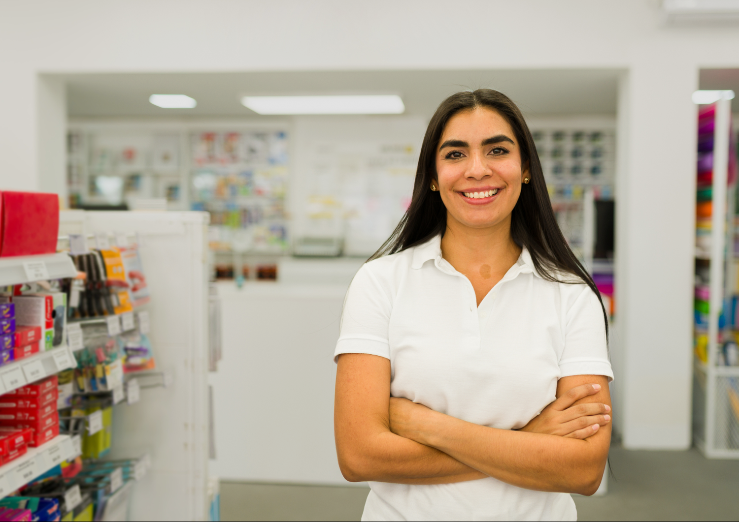 Retail employee smiling in store