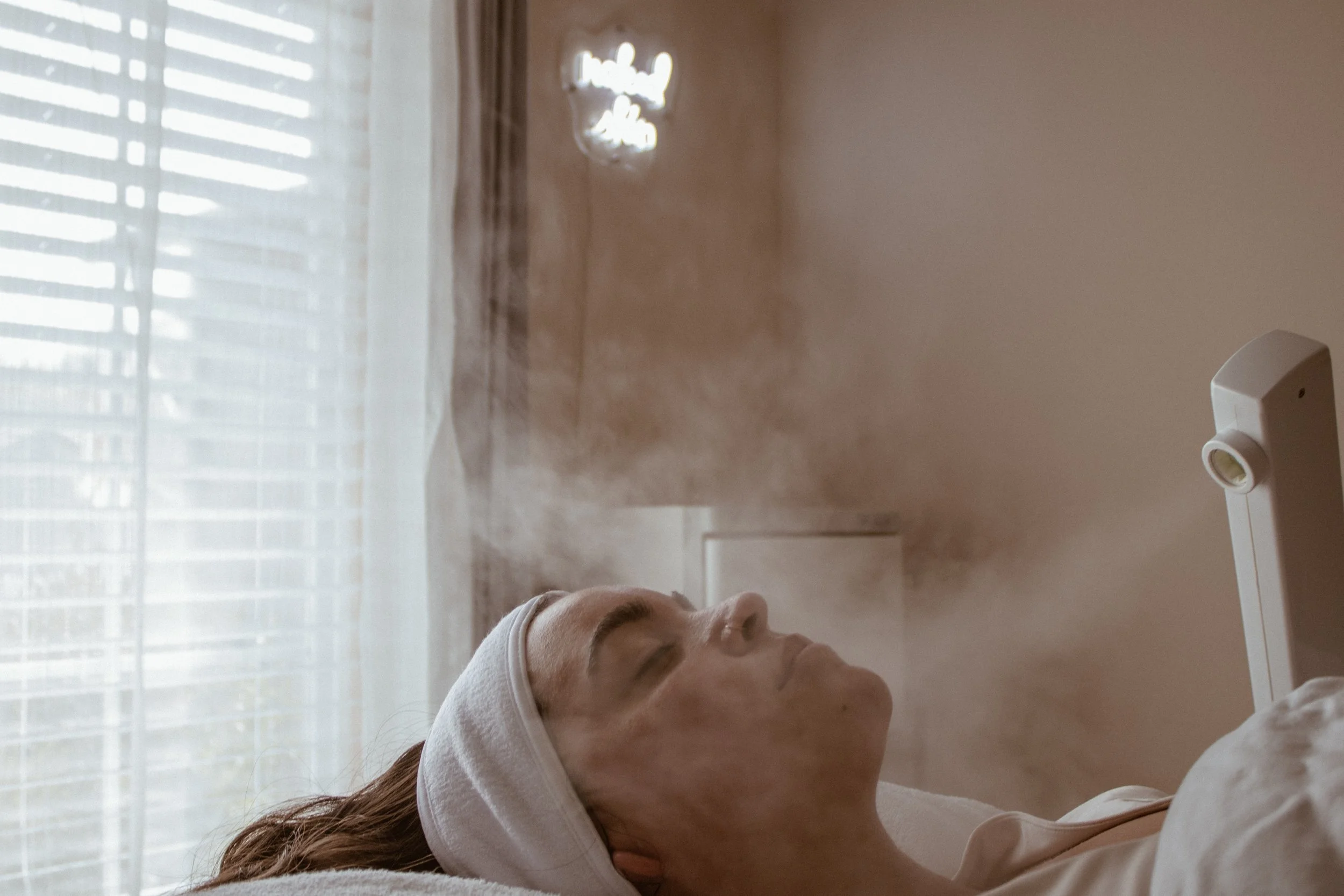 Customized facial treatment at Naked Skin Esthetics in Vancouver, WA, combining corrective skincare and restorative relaxation with master esthetician Mackenzie Dodson