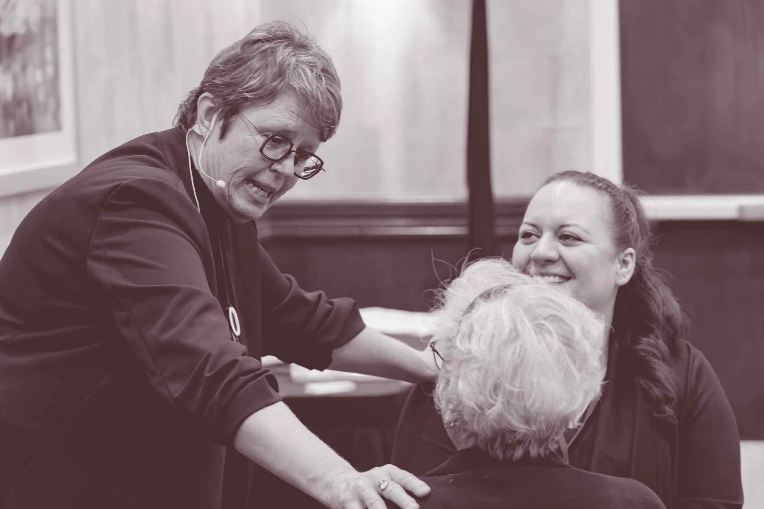  Susan Lynn connecting personally with attendees during a Connect to Empower gathering 