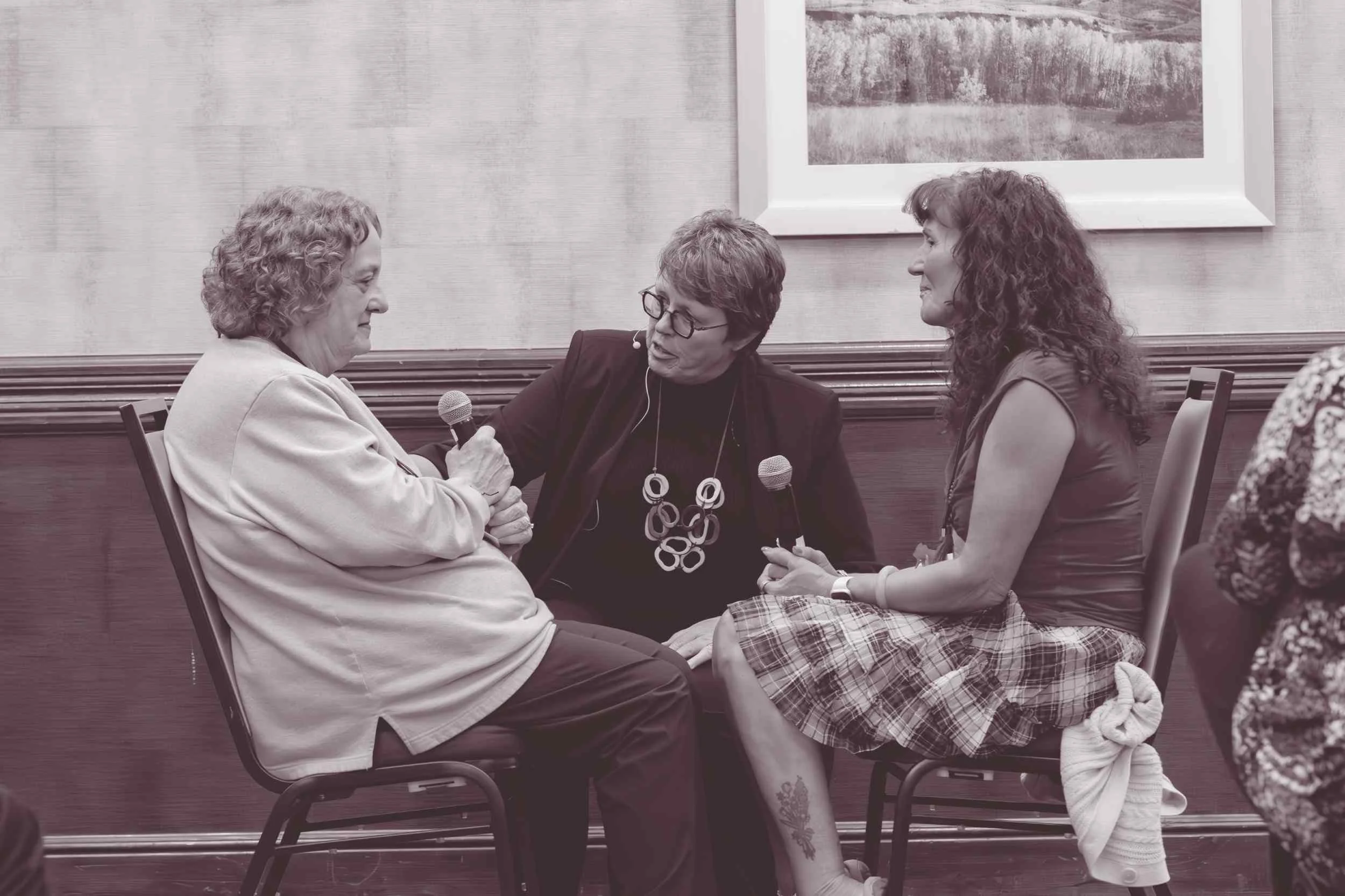  Conference attendees participating in an interactive group discussion during a Connect to Empower event 