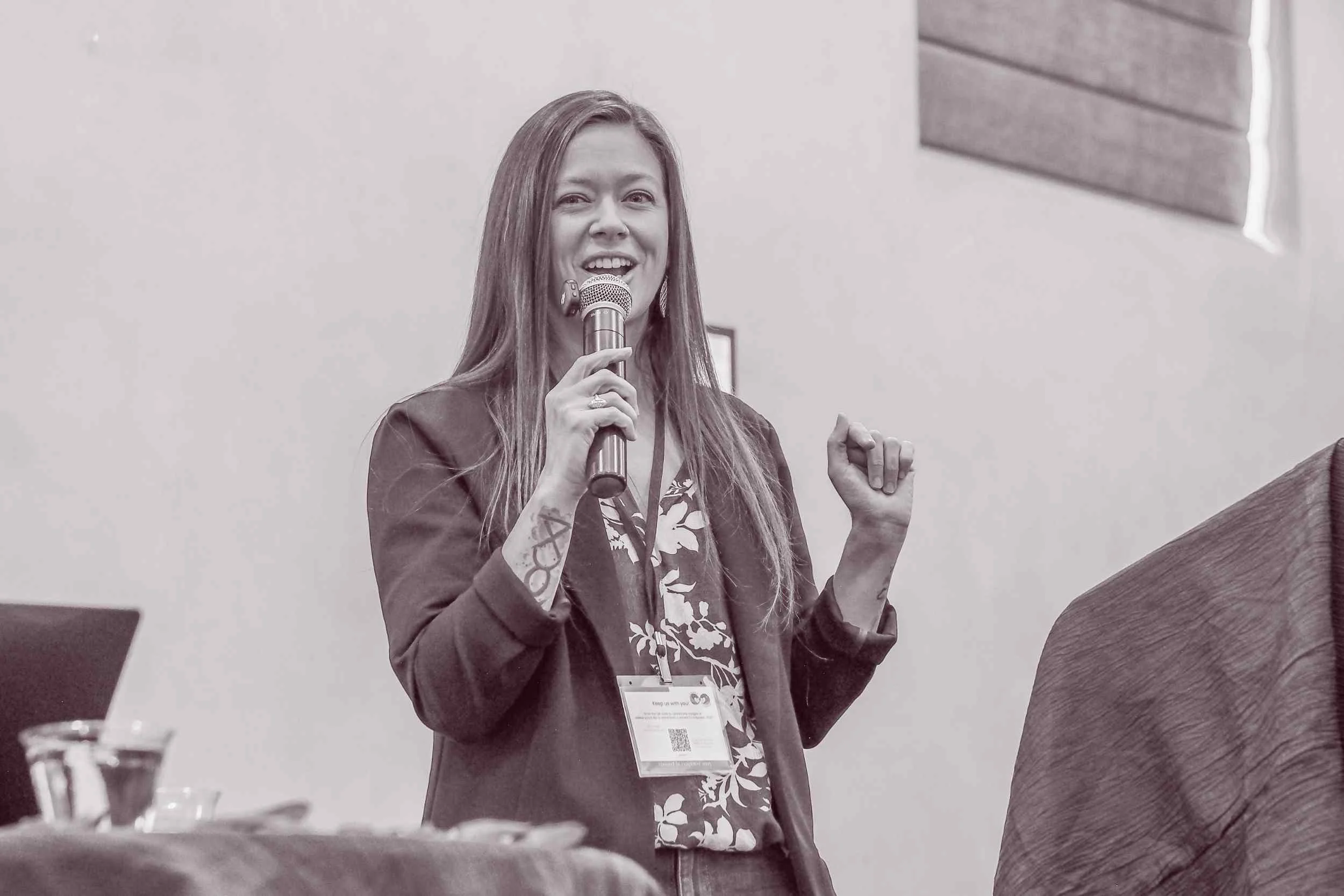  Guest speaker presenting to attendees during a live Connect to Empower spiritual conference 
