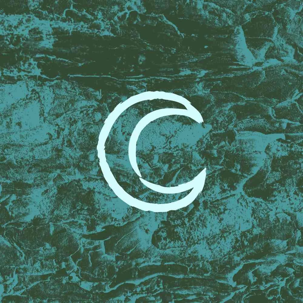 Moon icon on top of ocean waves in a blue tone
