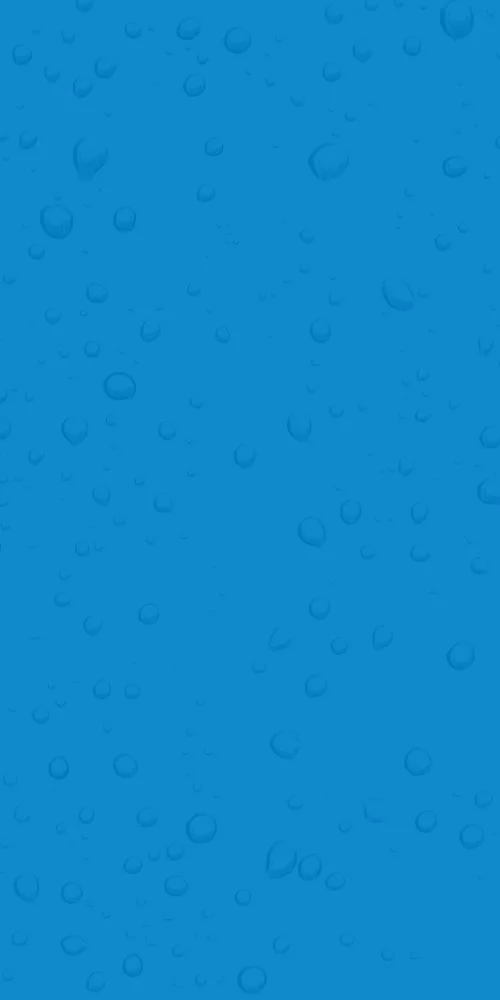 Close-up of a blue background with water droplets scattered across the surface.