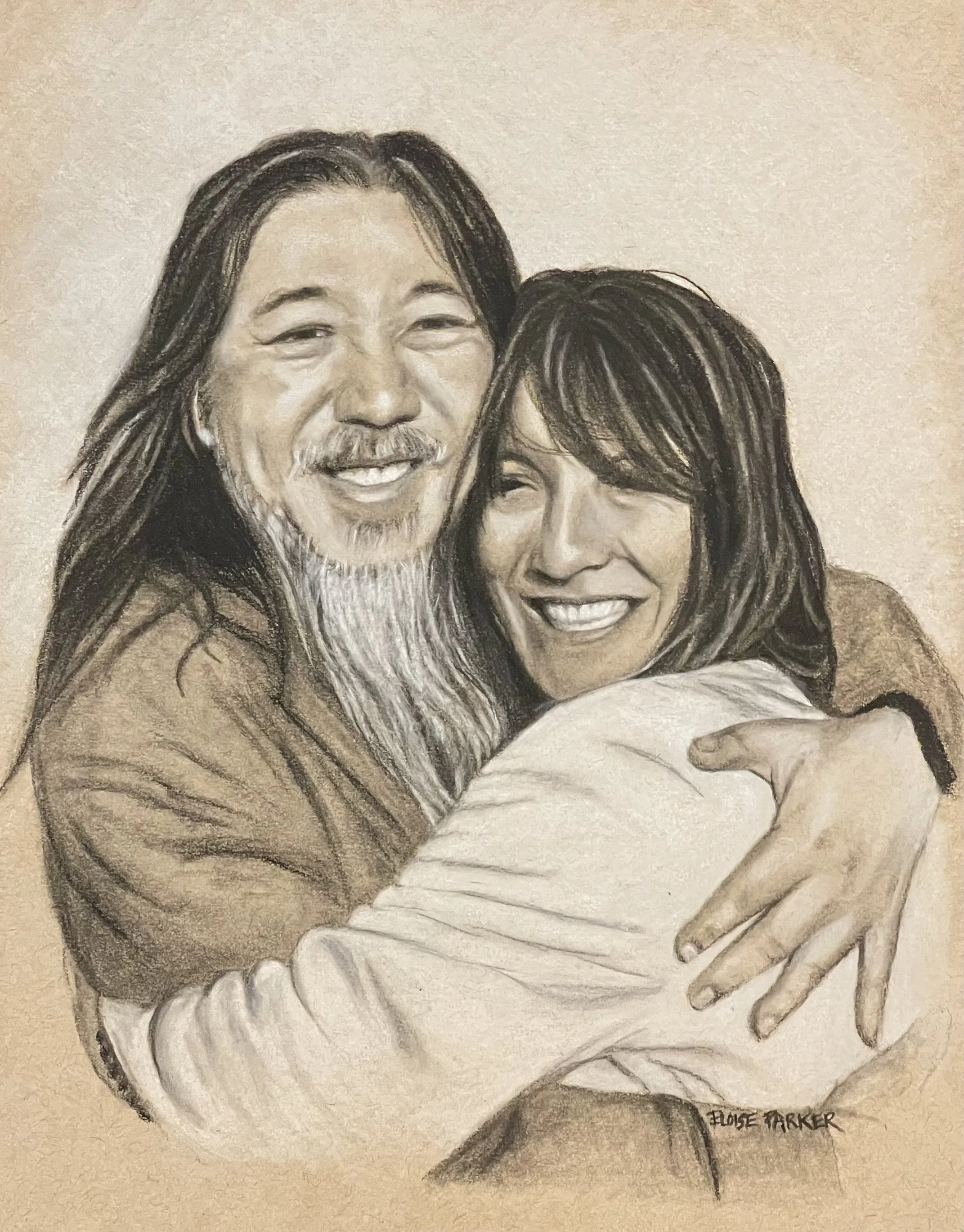 A detailed portrait drawing of a man with long hair and a beard hugging a woman with shoulder-length dark hair, both smiling warmly. Copyright Eloise Parker.
