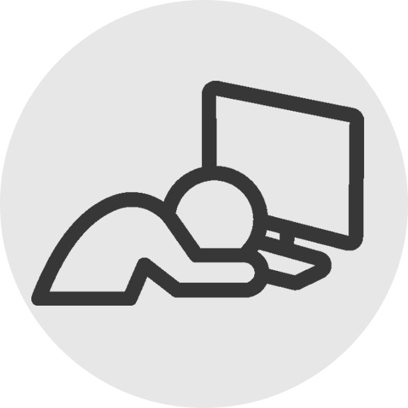 Stick figure with head on desk in front of computer, fatigue or frustration concept.